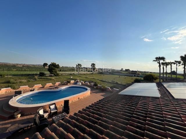 Foto a7971383-b1ed-4bd1-b6d7-592772cfed6e. Masia amb piscina a Dolores