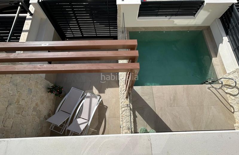 Foto c47dd0e1-bdac-4b1f-8ad4-b352b0b8b8dc. Casa adossada amb piscina a Dolores