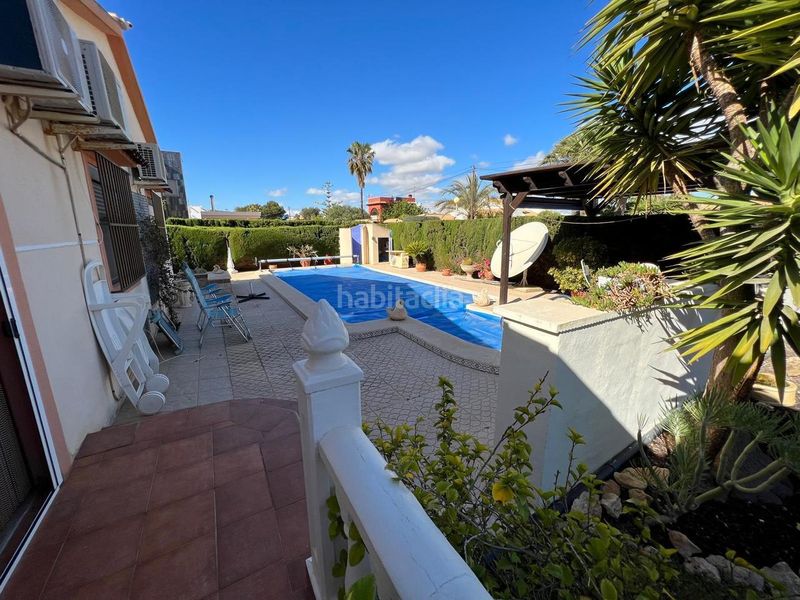 Foto 839847bb-fb1a-4fc4-be5c-0652636f2168. Casa amb aparcament a Cabo Roig Orihuela