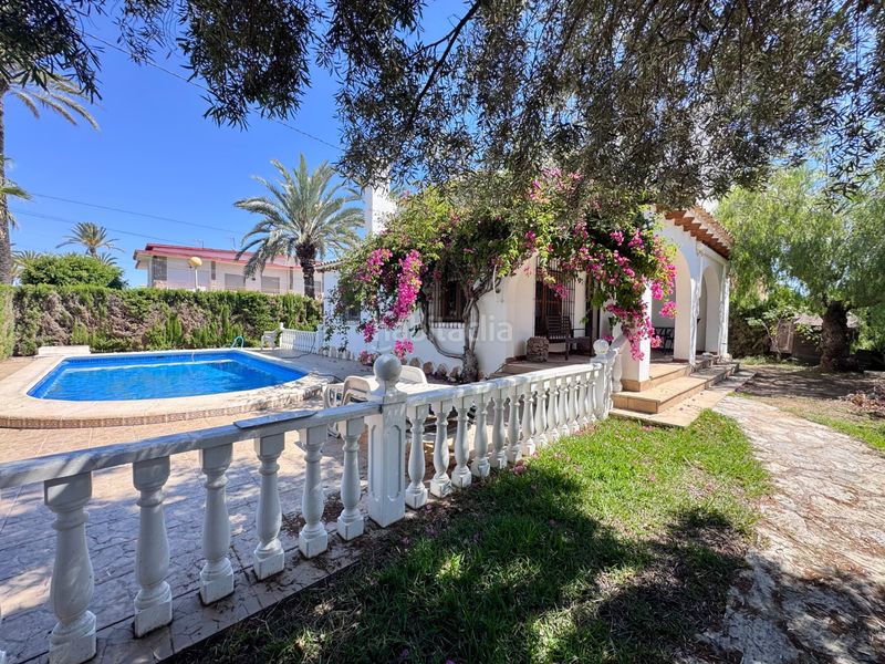 Foto 096bea7f-4b09-491e-a517-16b0e602c76b. Casa amb aparcament a Cabo Roig Orihuela