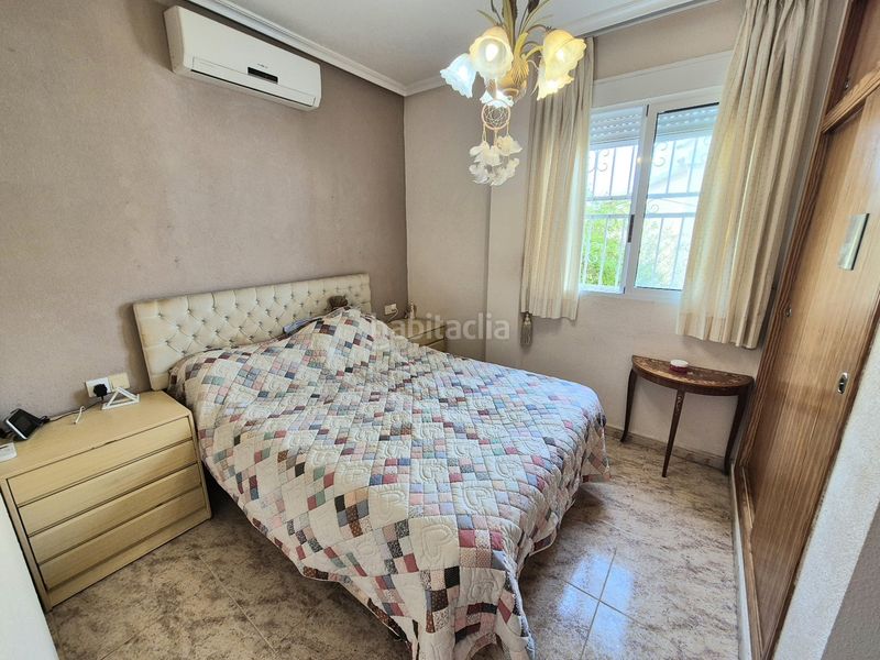Foto ed1b3ef9-705b-4337-88cd-8adb1c31cf0d. Casa amb aparcament a Los Balcones y los Altos Orihuela