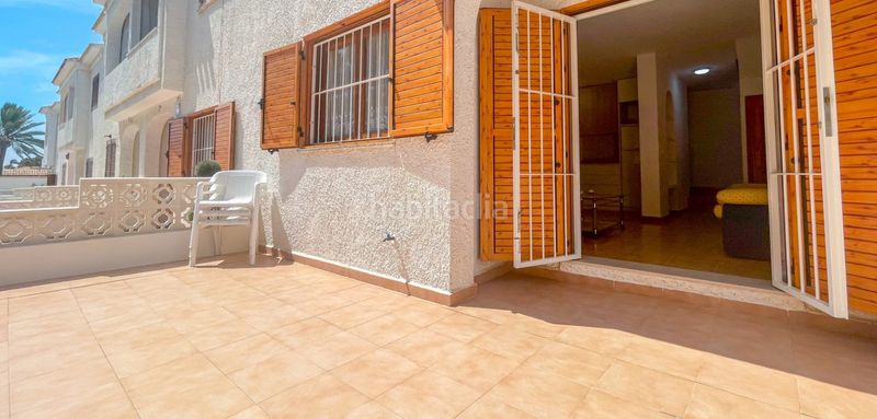 Foto 61fc8980-2920-4679-94e3-83368511f9cd. Casa adossada amb aparcament a Playa Flamenca Orihuela