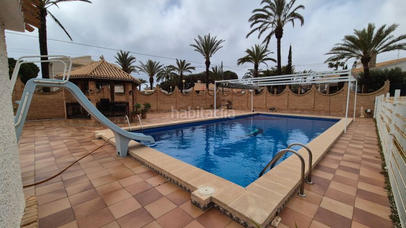 Foto 3de630f8-5606-48b8-bfd0-46145ae8b699. Casa amb aparcament a Cabo Roig Orihuela