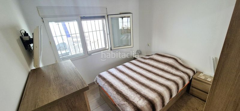 Foto 4afb943e-b593-485f-8c6c-bae3cc8c4300. Casa amb aparcament a Playa Flamenca Orihuela