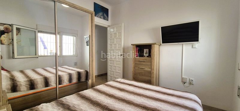 Foto 5dfd8ecc-f601-4621-9c57-9f73406dd249. Casa amb aparcament a Playa Flamenca Orihuela