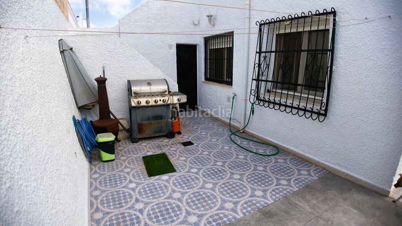 Foto b38f4e90-aaea-463f-b031-c60ccf686df2. Casa amb aparcament a Playa Flamenca Orihuela