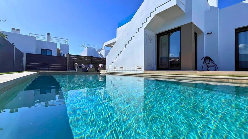 Foto c3acbf79-0e07-4e8e-8476-645de23e1aed. Casa adossada amb piscina a Cortes-Huertas Madrid