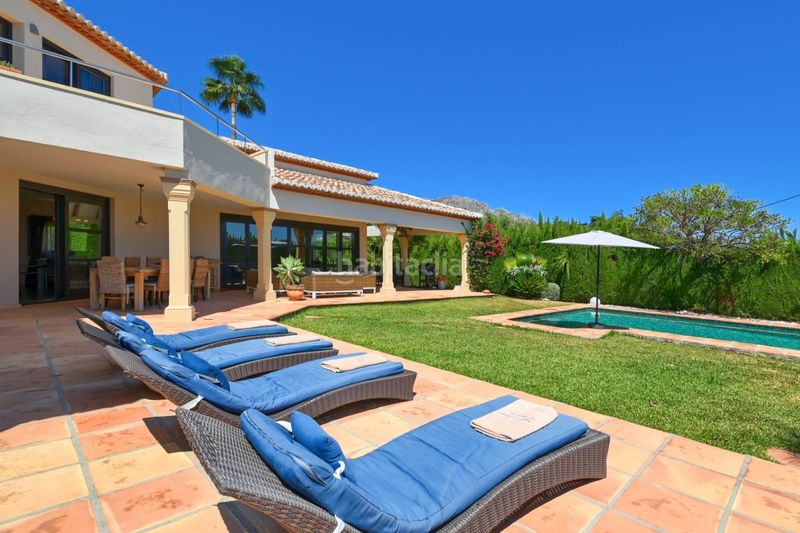 Foto 06066a7a-3187-443a-b986-55b617511f83. Casa amb xemeneia aparcament a Beniarbeig