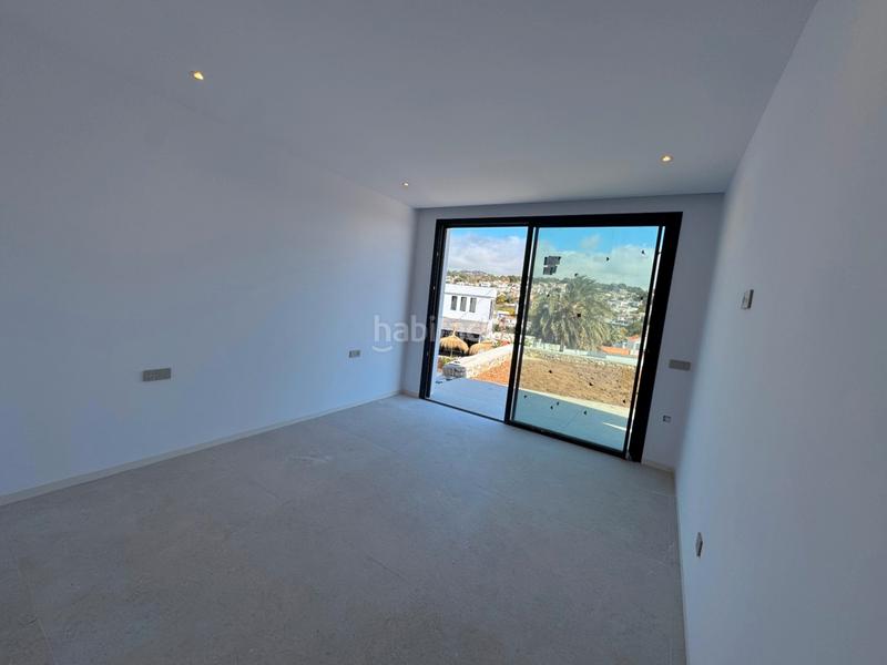 Foto 14767928-fcb0-494a-b6ec-fc950f6b9281. Chalet en La Fustera Benissa