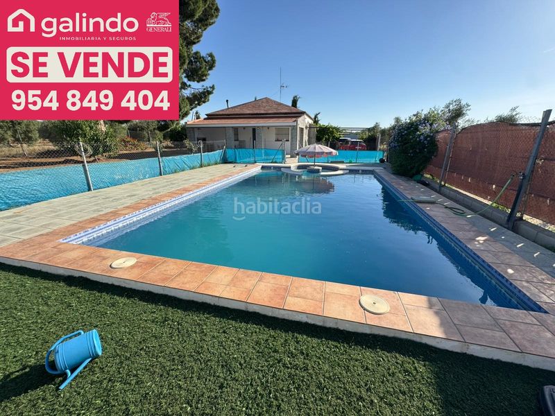 Foto f0142582-dd11-462a-b938-b69bc666af80. Xalet amb piscina a Marchena