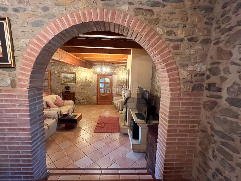 Foto 26b3b7f3-fa67-42d9-b423-7cb6353ce7eb. Casale con camino riscaldamento piscina in Juià