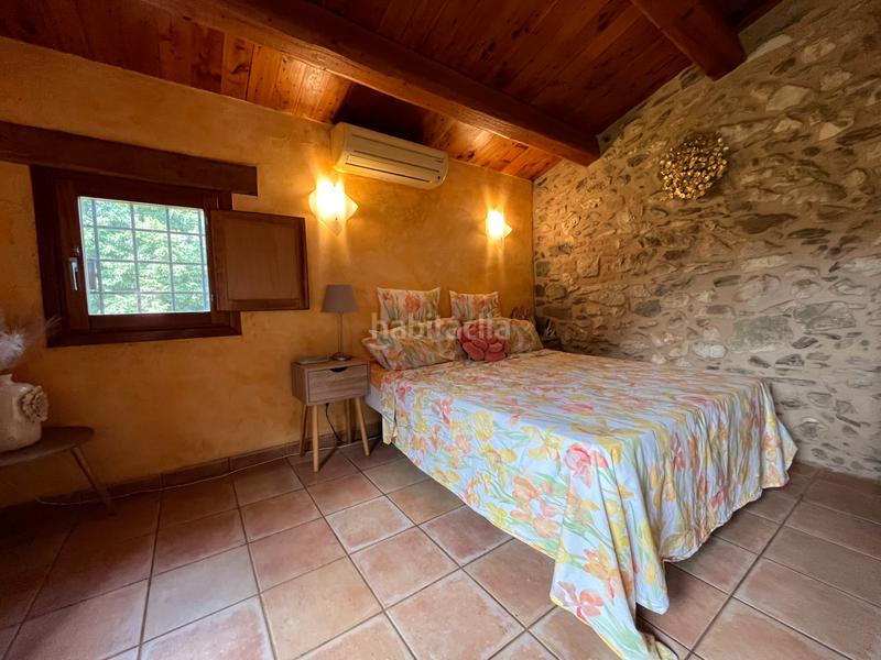 Foto 6d206115-9ec3-4910-9409-3323798523a4. Casale con camino riscaldamento piscina in Juià