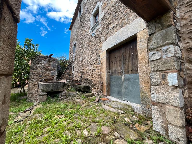 Foto c5c51a77-f69d-46e8-a52a-e18c4fecb374. Casale con camino riscaldamento piscina in Juià