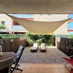 Planta baixa  Urbanització eucaliptus. Bajo de 2 hab. equipado. terraza-jardín y parquing