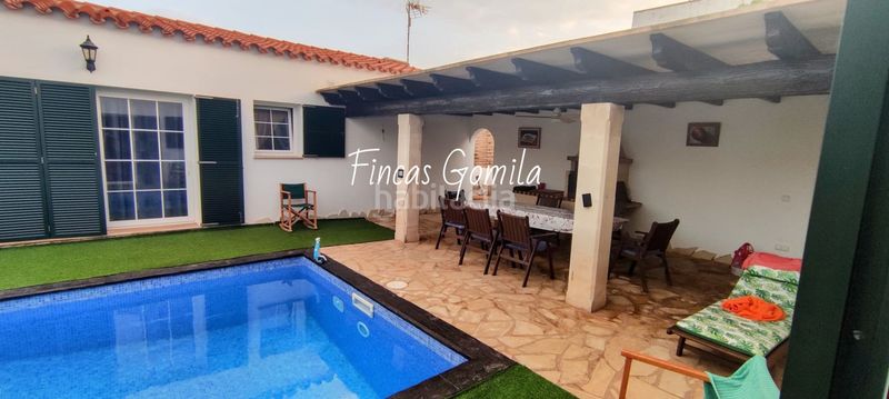 Foto f2f0ad5f-a8be-4832-9909-72807838bd8a. Casa amb calefacció aparcament piscina a Na Macaret Es Mercadal