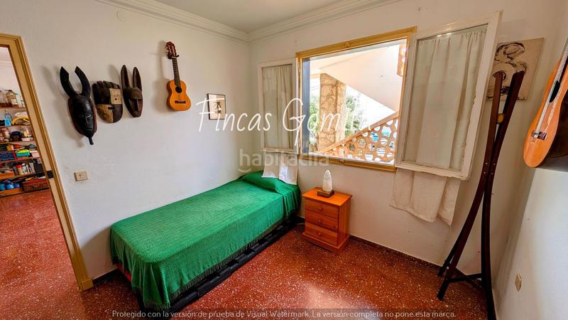 Foto 1166294f-3ded-4ffc-b9ea-ca833e339d6b. Maison dans Biniancolla-Punta Prima Sant Lluís