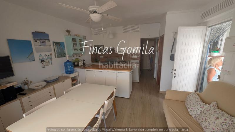 Foto 54ab9f81-d094-437c-84eb-70f4c5db727c. Apartamento  frente al mar en Na Macaret Es Mercadal