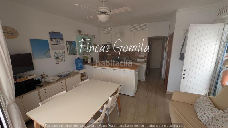 Foto 56405a23-cb07-468d-beaf-fe3fe6b29c96. Apartamento  frente al mar en Na Macaret Es Mercadal