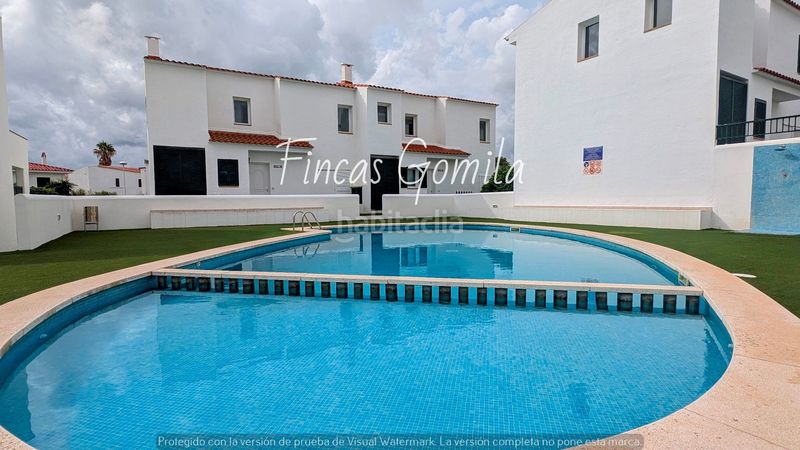 Foto a26240df-4468-48d3-b9fe-43ab975a25e8. Casa adossada amb calefacció piscina a Arenal d´en Castell Es Mercadal