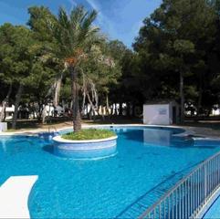 Appartement à Cala d´En Bosch-Serpentona. Apartamento reformado con terraza privada en son xoriguer  a sol