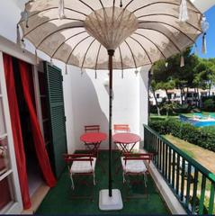Apartament a Cala d´En Bosch-Serpentona. Apartamento reformado con terraza privada en son xoriguer  a sol