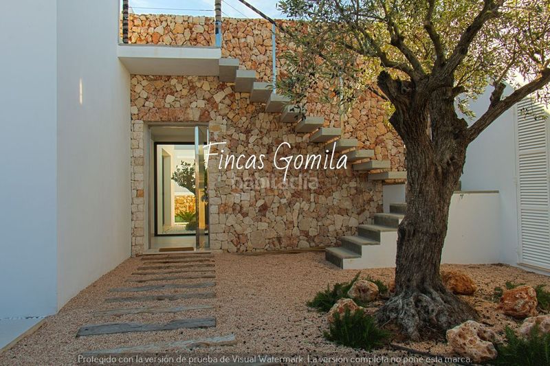 Foto f1dc00c7-28b1-4312-a97c-2d1f061f6daf. Casa amb calefacció piscina a Arenal d´en Castell Es Mercadal