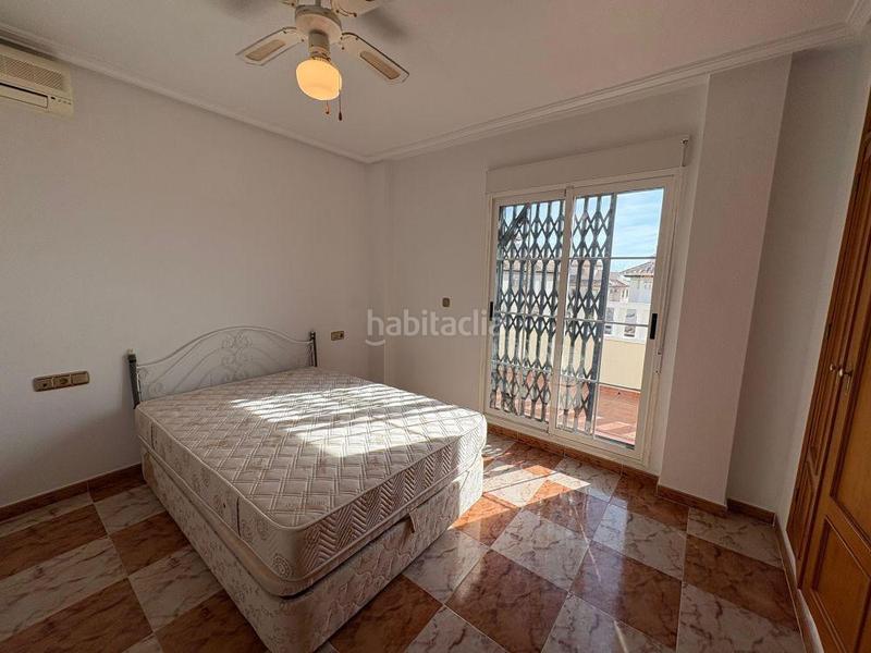 Foto 027fd47b-c9b2-4ccb-90fa-043e80f81887. Casa pareada adosado duplex con gran terraza jardín y piscina en lomas de cabo roig, costa en Orihuela