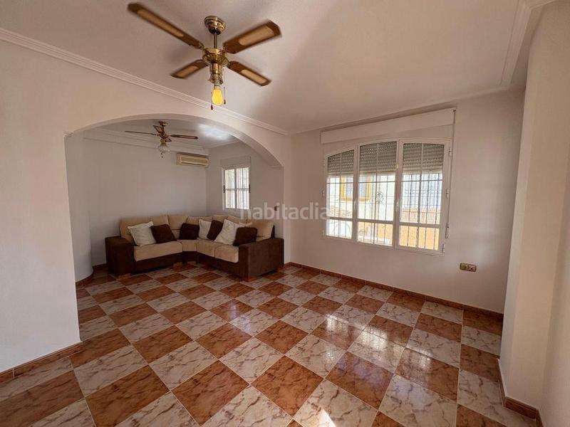 Foto 0a67546f-7e73-409f-b790-b9d922f433fe. Casa pareada adosado duplex con gran terraza jardín y piscina en lomas de cabo roig, costa en Orihuela