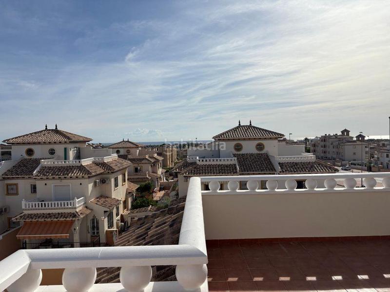 Foto 2427a82f-0c44-442b-b501-762abeba714e. Casa pareada adosado duplex con gran terraza jardín y piscina en lomas de cabo roig, costa en Orihuela