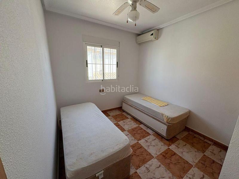 Foto 904741a3-c048-4e60-89b2-b94fbcce3c77. Casa pareada adosado duplex con gran terraza jardín y piscina en lomas de cabo roig, costa en Orihuela