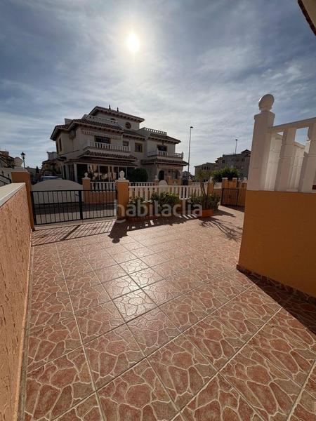 Foto b04c0d1c-31d3-434b-9f61-2aa8e89be244. Casa pareada adosado duplex con gran terraza jardín y piscina en lomas de cabo roig, costa en Orihuela