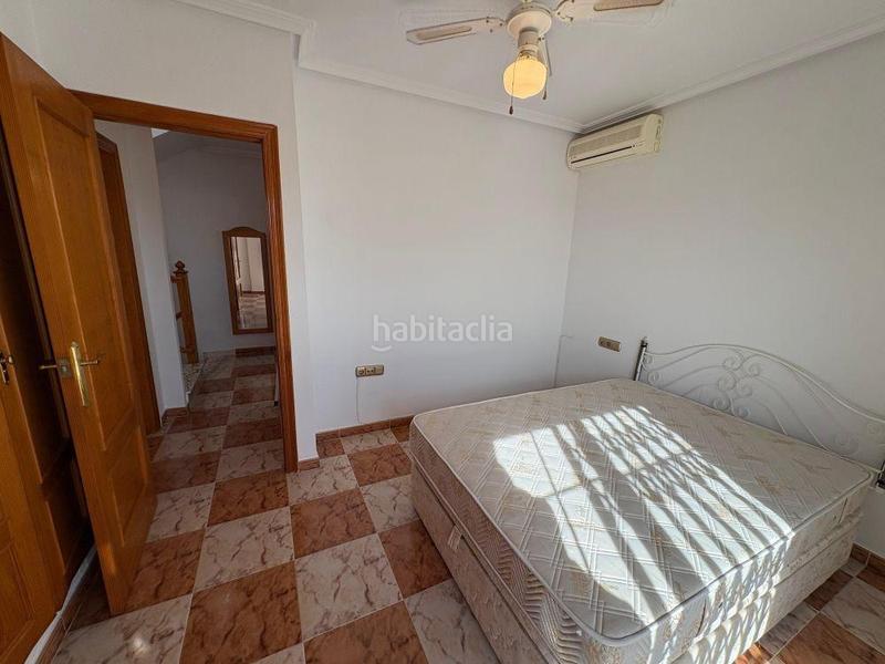 Foto ba7abc91-6a26-440d-82a0-8c8e0f22728d. Casa pareada adosado duplex con gran terraza jardín y piscina en lomas de cabo roig, costa en Orihuela