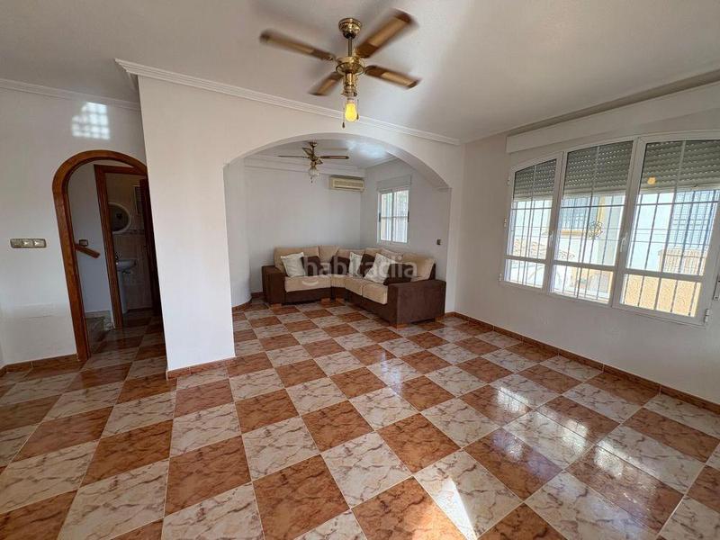 Foto e60f1595-84fb-4cc6-9664-bca18e53d7fa. Casa pareada adosado duplex con gran terraza jardín y piscina en lomas de cabo roig, costa en Orihuela