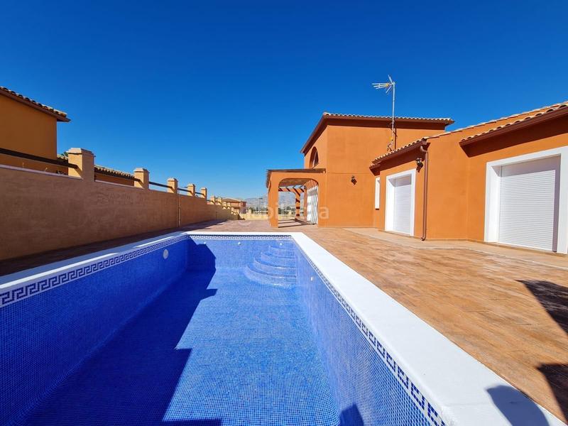 Foto 39919ff4-942a-405f-bf0b-c14229f59a63. Xalet amb aparcament piscina a Busot