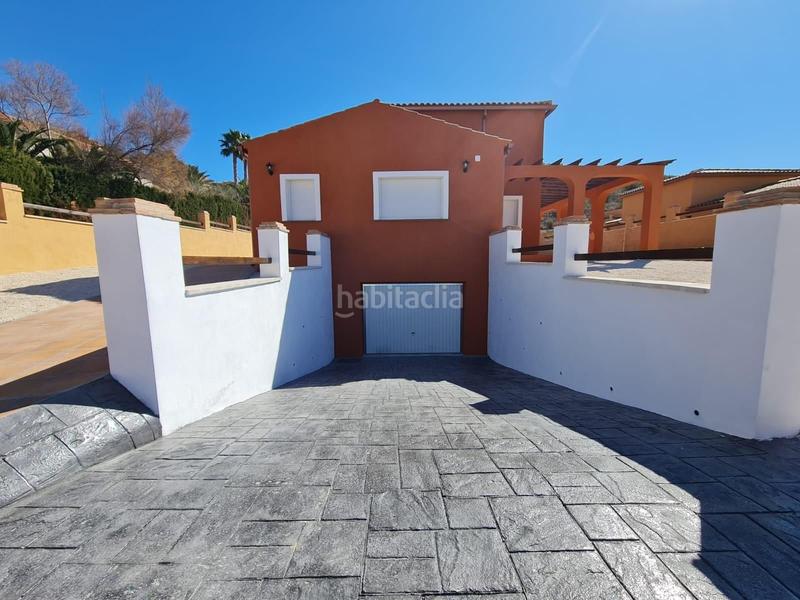 Foto c92173fc-a2d5-458d-944a-db926bfcd709. Xalet amb aparcament piscina a Busot