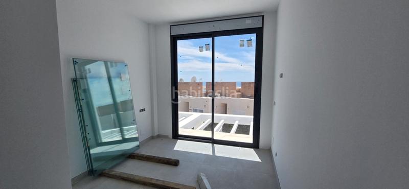 Foto 11a6e7ea-b0dc-4ba8-b5e8-95f6f37d4762. Casa adosada en n/a adosados en venta costa ( El Peñoncillo) 2 dormitorios, piscina y garaje en Torrox