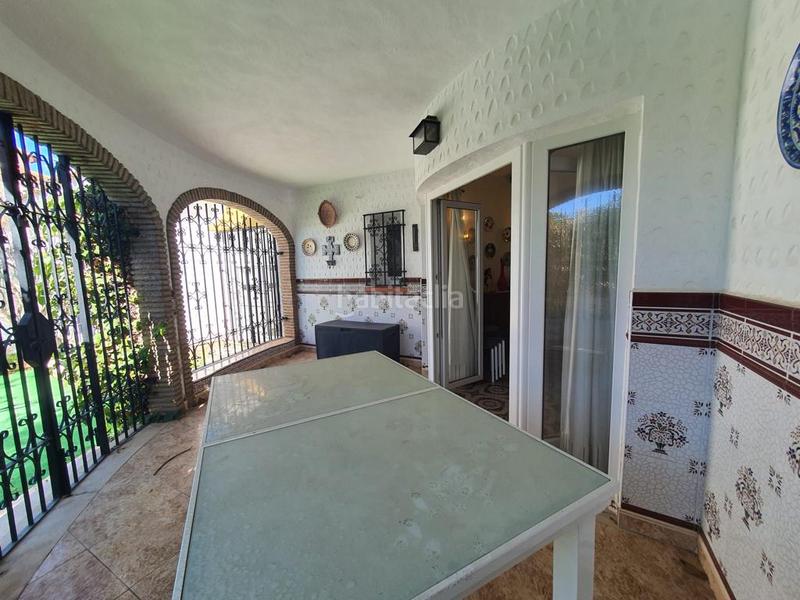 Foto 13e5d66e-f6c5-43e6-82ec-111e70705672. Chalet  en venta costa con 4 dormitorios 2 linea de playa en Torrox