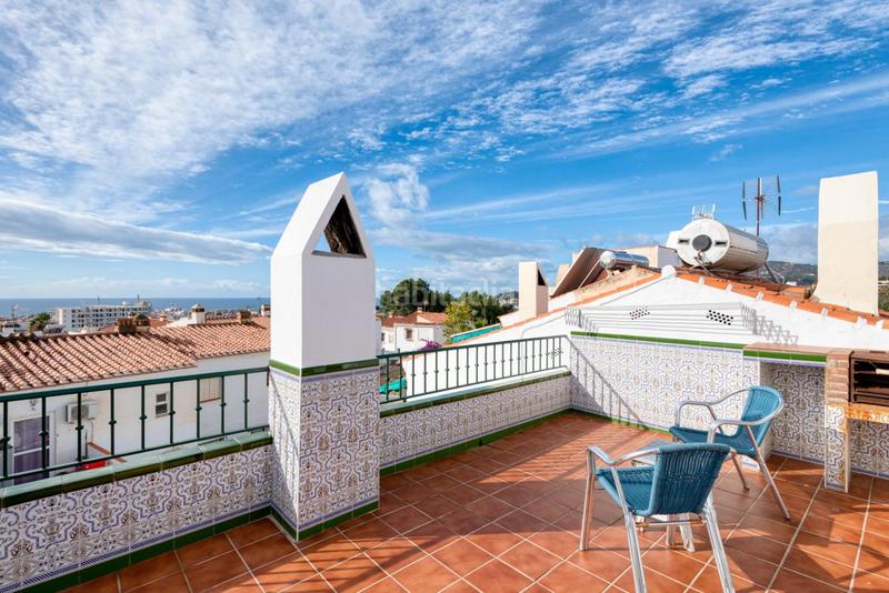 Foto 5ede0cbb-fa78-48af-9b59-18c78040f6d1. Casa a schiera con camino riscaldamento parcheggio piscina in Nerja