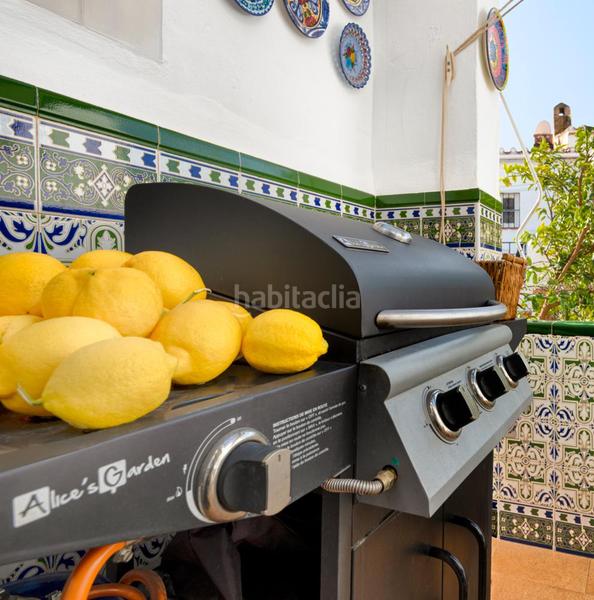 Foto b3be0bcc-b0c2-43d1-b313-c3e50c085f01. Casa a schiera con camino riscaldamento parcheggio piscina in Nerja