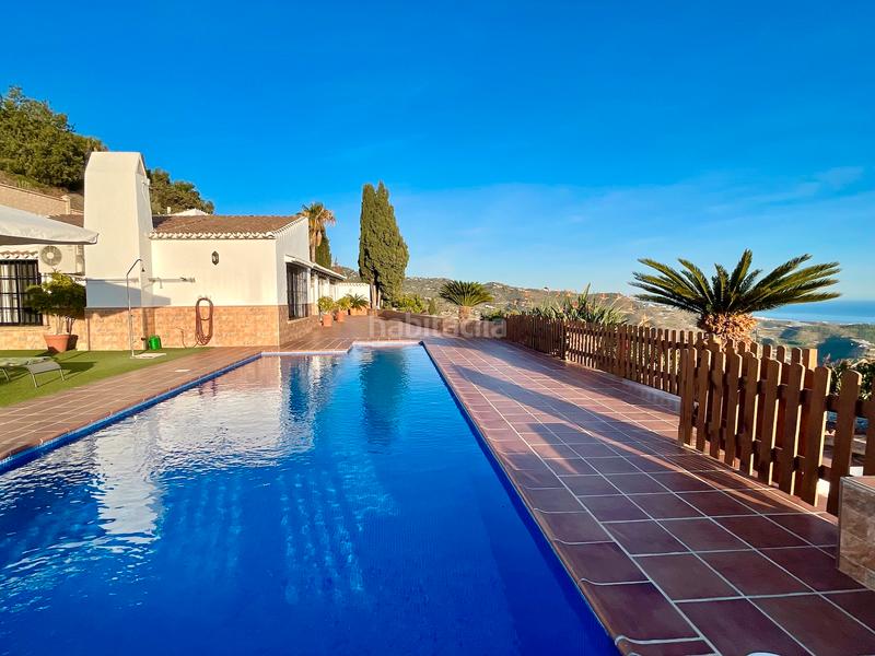 Foto 94b6d6a6-3edd-4a97-9f2c-f541758b25c8. Chalet con camino riscaldamento parcheggio piscina in Algarrobo