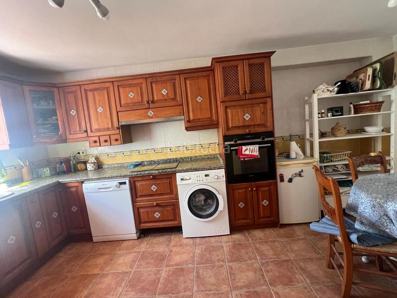 Foto 420e3d7e-17c2-46c8-a901-0327f9580f4e. Maison jumelée avec cheminée chauffage piscine dans Nerja