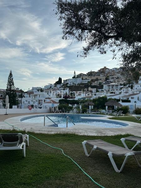 Foto df9e1542-8d6e-4a99-81a2-7b055e2b1029. Duplex con camino riscaldamento piscina in Chaparil - Torrecilla - Punta Lara Nerja