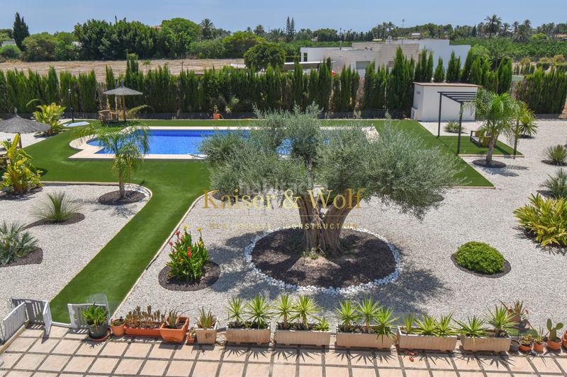 Foto 20add30b-e0b6-40c7-91b6-ce1e8a449449. Casa amb calefacció piscina a Las Bayas Elche / Elx