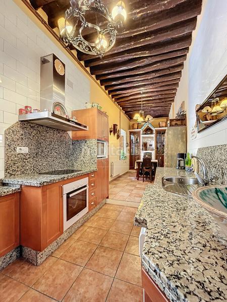 Foto 406d0296-6c21-4ac5-b783-58b46617cda0. Casa adosada adosado en calle larga, en Santa Fe