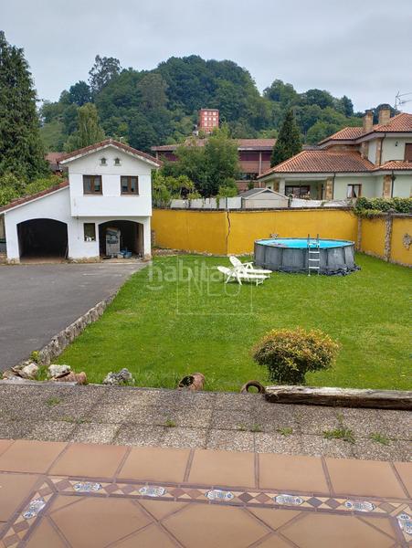 Foto 4a0e6188-27a8-426c-8db1-f387039f943e. Casa aparellada amb calefacció aparcament a La Felguera Langreo