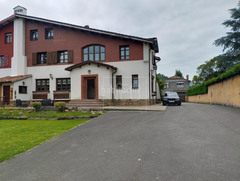 Foto f7408180-cbd1-4f97-b951-621c1c10e4be. Casa aparellada amb calefacció aparcament a La Felguera Langreo