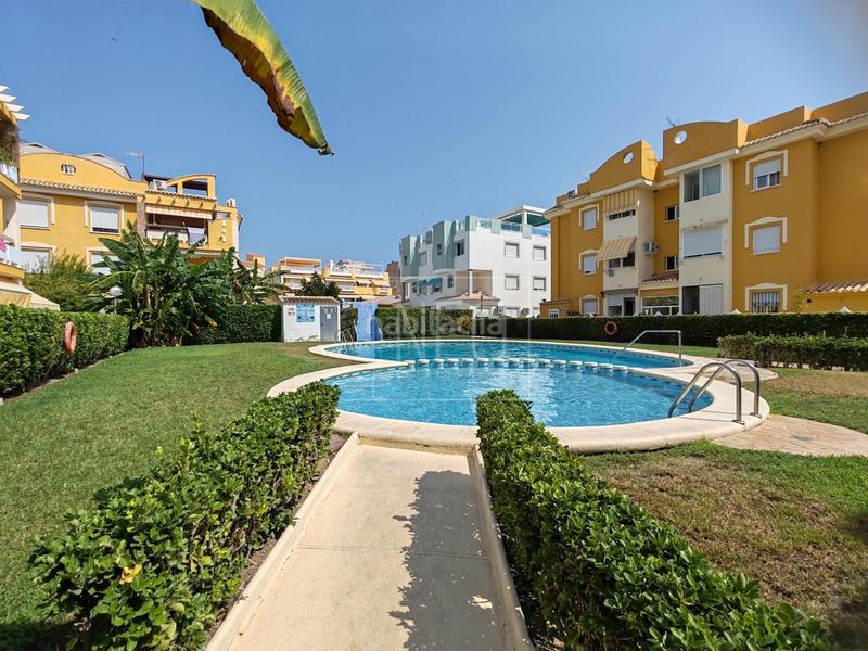 Foto 3c32dba0-0327-41a5-b656-e5bcdeb0e1f8. Piso  en av borrons, playa en Xeraco