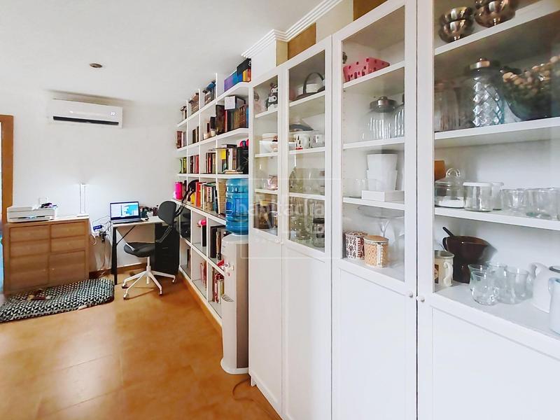 Foto be823700-fb1d-40c6-ba2f-f0e601dcefe8. Casa aparellada amb aparcament a Polinyà de Xúquer