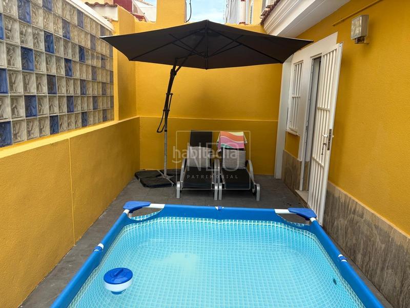 Foto f29a889b-3a9e-4d5b-a253-3db4e2c91317. Casa adossada amb calefacció aparcament a Bulevar del Xúquer Cullera