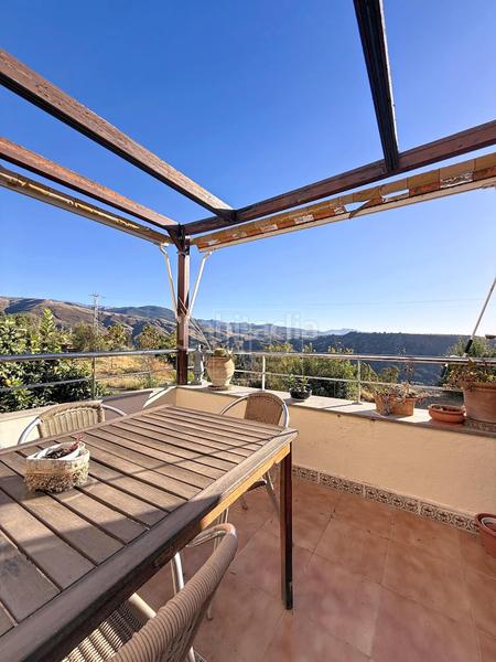 Foto 78e23cd1-df20-478d-9c80-ad55bf25e5d6. Casa adossada amb calefacció aparcament piscina a Cenes de la Vega